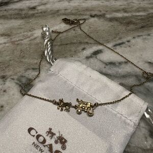 Coach Gold Carriage Pendant Necklace
